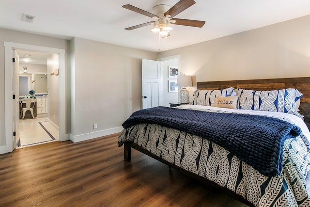 67881 Edgewater Beach Rd, White Pigeon, MI 49099 - bedroom featuring wood finished floors, baseboards, and ceiling fan