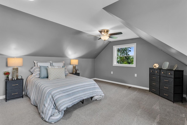 4380 W Chicago Rd, Jonesville, MI 49250 - carpeted bedroom featuring baseboards, vaulted ceiling, and ceiling fan