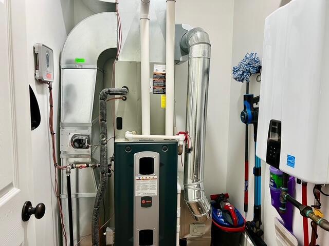 2985 Middle Lake Rd, Twin Lake, MI 49457 - utilities with tankless water heater