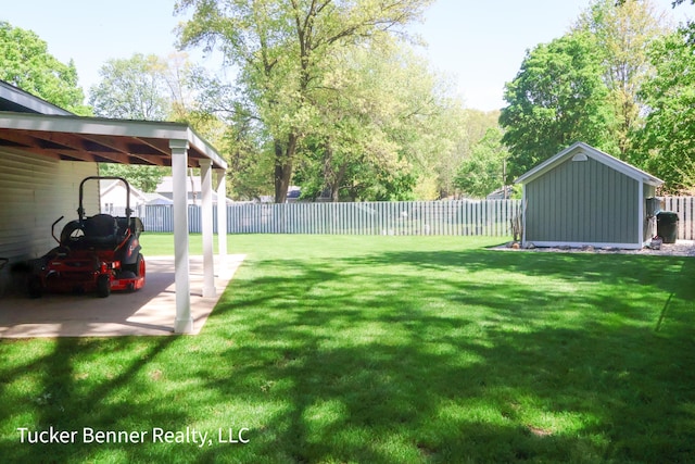 2985 Middle Lake Rd, Twin Lake, MI 49457 - view of yard with an outbuilding and a carport