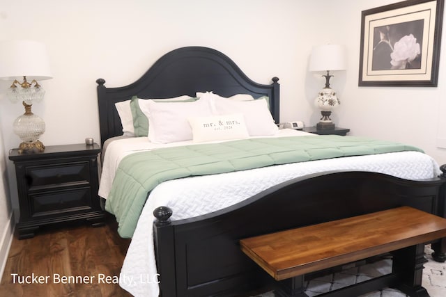 2985 Middle Lake Rd, Twin Lake, MI 49457 - bedroom featuring dark wood-type flooring