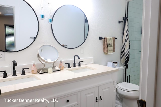 2985 Middle Lake Rd, Twin Lake, MI 49457 - bathroom with double vanity, toilet, and tiled shower