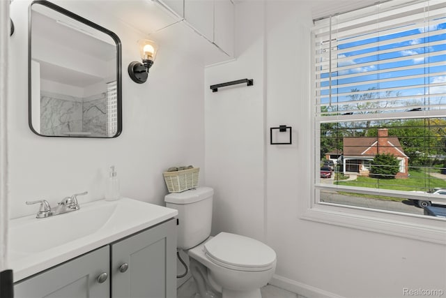 10576 Somerset Ave, Detroit, MI 48224 - bathroom with vanity, toilet, and baseboards