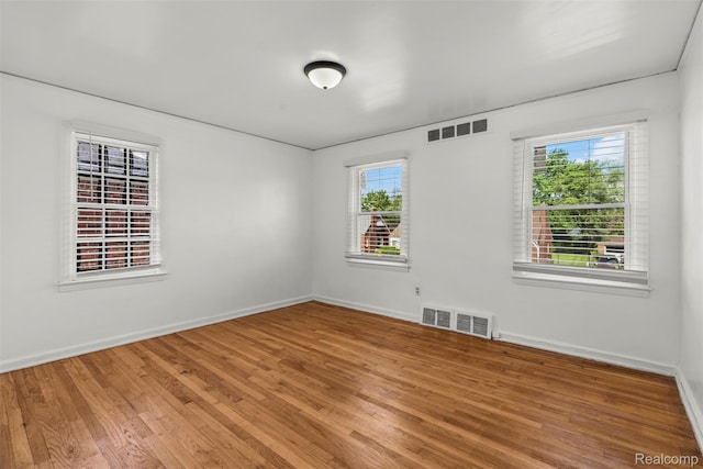 10576 Somerset Ave, Detroit, MI 48224 - unfurnished room with light wood-type flooring and baseboards
