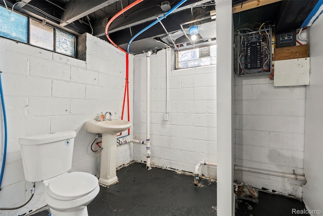 10576 Somerset Ave, Detroit, MI 48224 - bathroom featuring toilet, unfinished concrete flooring, and a sink