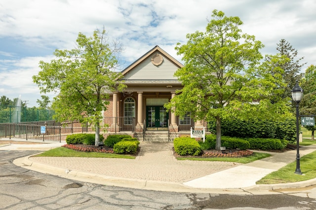 3039 Barclay Way, Ann Arbor, MI 48105 - greek revival inspired property with covered porch and brick siding