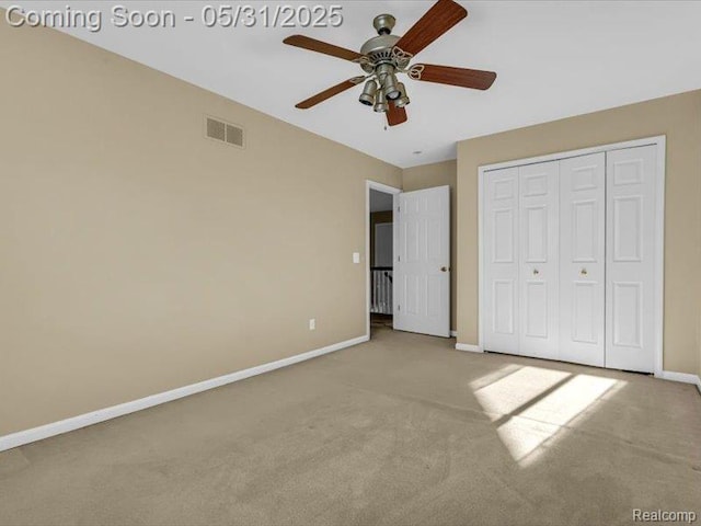1387 Hartland Dr, Troy, MI 48083 - unfurnished bedroom featuring carpet floors, baseboards, a closet, and ceiling fan