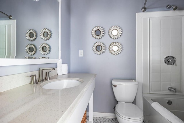 14438 Spring Creek Dr, New Buffalo, MI 49117 - bathroom with toilet, vanity,  shower combination, tile patterned flooring, and baseboards