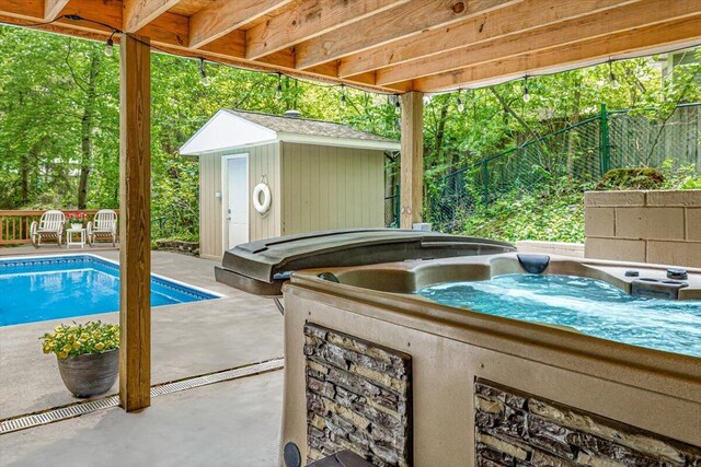 14438 Spring Creek Dr, New Buffalo, MI 49117 - outdoor pool with a hot tub and a patio area