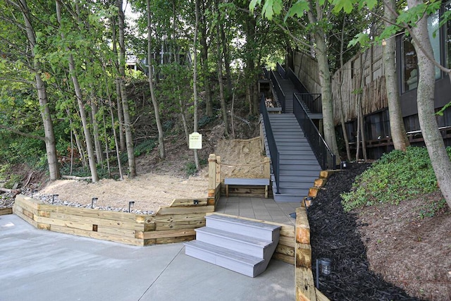 14438 Spring Creek Dr, New Buffalo, MI 49117 - view of yard with stairway and a patio