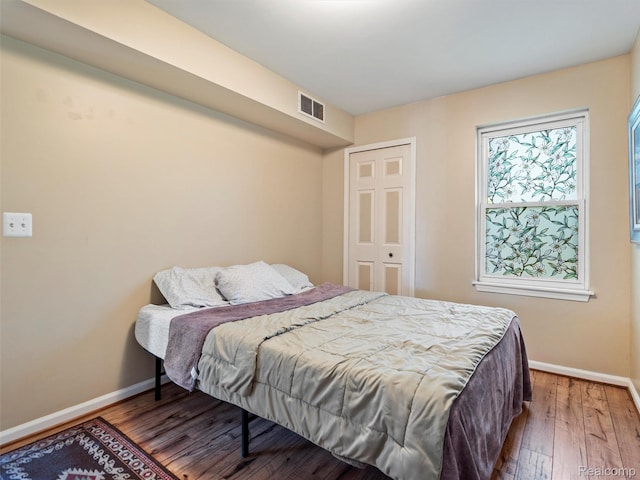 23091 Berdeno Ave, Hazel Park, MI 48030 - bedroom with baseboards and wood finished floors