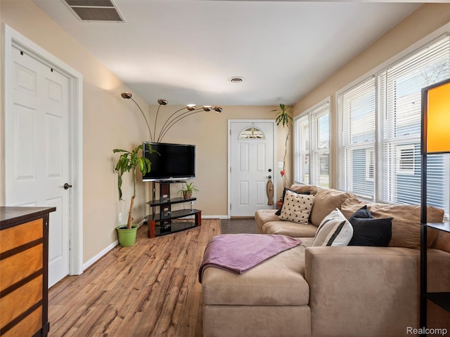 23091 Berdeno Ave, Hazel Park, MI 48030 - living room with hardwood / wood-style flooring and baseboards