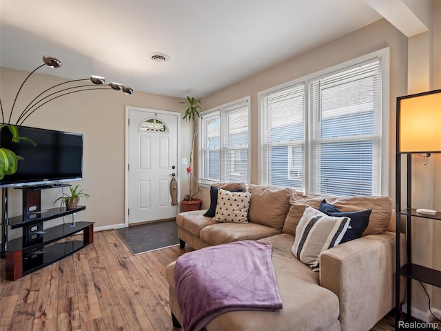 23091 Berdeno Ave, Hazel Park, MI 48030 - living room with hardwood / wood-style flooring and baseboards