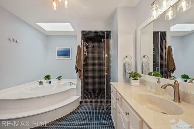 2983 Woodcreek Way, Bloomfield Hills, MI 48304 - full bath featuring a skylight, vanity, a stall shower, a garden tub, and tile patterned floors
