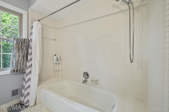 2983 Woodcreek Way, Bloomfield Hills, MI 48304 - bathroom featuring tile patterned flooring and shower / bath combo