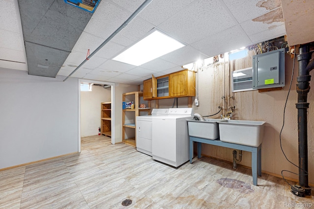 4772 Marian Ave, Warren, MI 48092 - washroom with washer and dryer, cabinet space, and electric panel