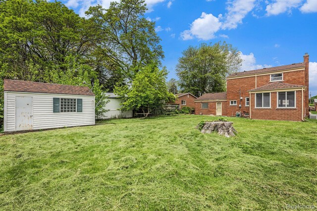 4772 Marian Ave, Warren, MI 48092 - view of green lawn with an outdoor structure