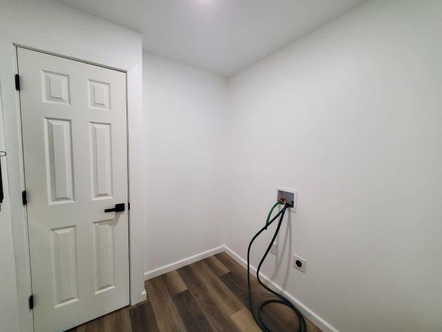 2153 Flowage Lake Rd, West Branch, MI 48661 - laundry room featuring baseboards, dark wood-type flooring, washer hookup, and hookup for an electric dryer