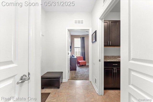 23893 Manistee Ln, Flat Rock, MI 48134 - corridor with baseboards and light colored carpet