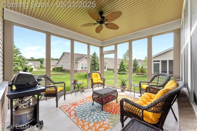 23893 Manistee Ln, Flat Rock, MI 48134 - sunroom featuring an outdoor living space, ceiling fan, and a residential view