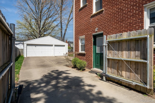 1978 Wiltshire Rd, Berkley, MI 48072 - view of side of property featuring brick siding, an outbuilding, and a garage