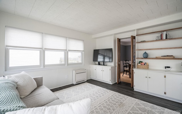 1978 Wiltshire Rd, Berkley, MI 48072 - living area featuring heating unit, plenty of natural light, and dark wood-type flooring