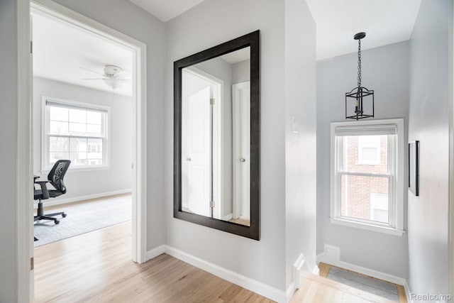 1978 Wiltshire Rd, Berkley, MI 48072 - hallway featuring light wood-type flooring, baseboards, and a desk