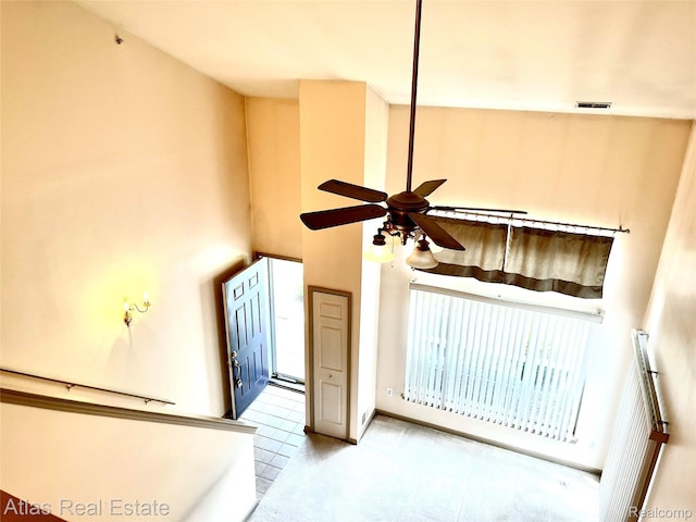 25727 Maritime Cir S, Harrison Township, MI 48045 - stairs with a ceiling fan and a high ceiling