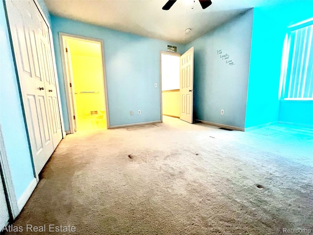 25727 Maritime Cir S, Harrison Township, MI 48045 - unfurnished bedroom featuring carpet, baseboards, ensuite bath, a closet, and ceiling fan
