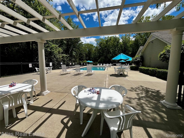 25727 Maritime Cir S, Harrison Township, MI 48045 - view of patio featuring outdoor dining space, a community pool, and a pergola