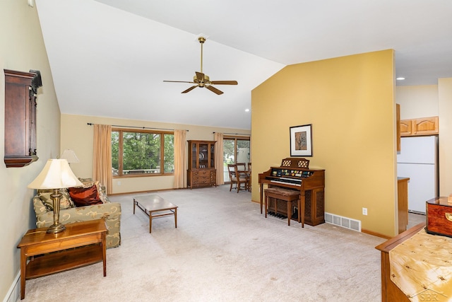 28 Barrington Cir, Saginaw, MI 48603 - living area with a ceiling fan, lofted ceiling, light colored carpet, and baseboards