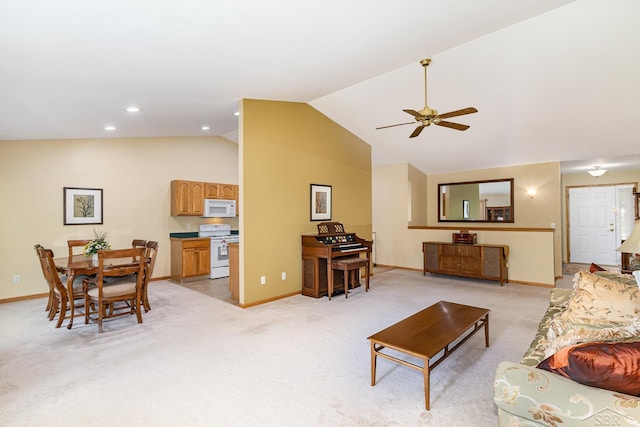 28 Barrington Cir, Saginaw, MI 48603 - living area featuring vaulted ceiling, ceiling fan, baseboards, and light colored carpet