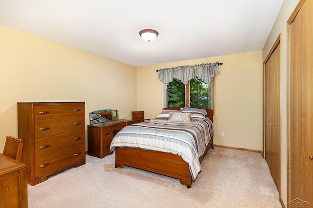 28 Barrington Cir, Saginaw, MI 48603 - bedroom featuring light carpet