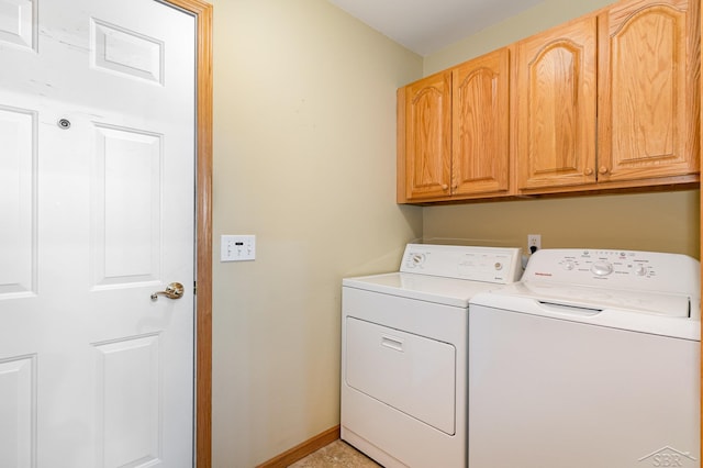 28 Barrington Cir, Saginaw, MI 48603 - washroom with cabinet space, washer and clothes dryer, and baseboards