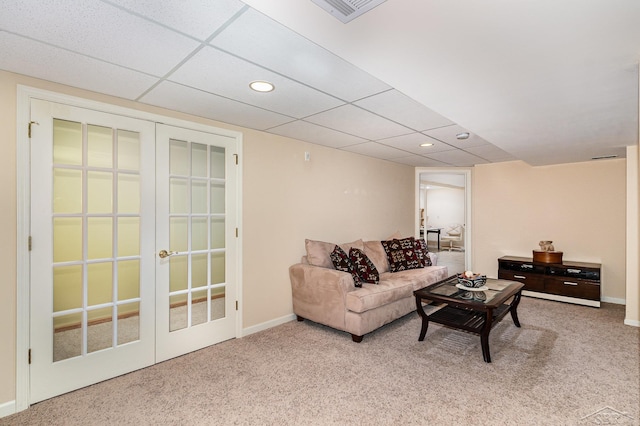 28 Barrington Cir, Saginaw, MI 48603 - living area with french doors, baseboards, recessed lighting, carpet, and a drop ceiling