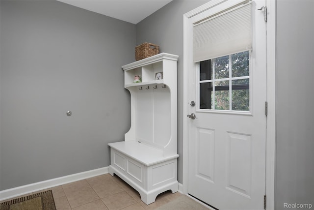 5687 Stonehaven Blvd, Rochester, MI 48306 - mudroom with baseboards and light tile patterned floors