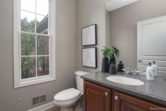 5687 Stonehaven Blvd, Rochester, MI 48306 - half bath featuring vanity and toilet