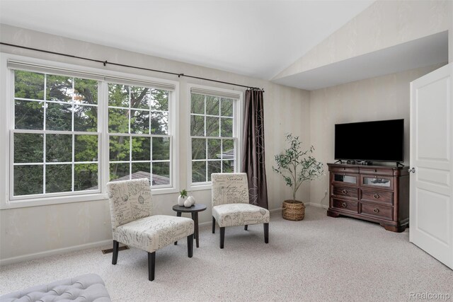 5687 Stonehaven Blvd, Rochester, MI 48306 - sitting room with vaulted ceiling, carpet, plenty of natural light, and baseboards