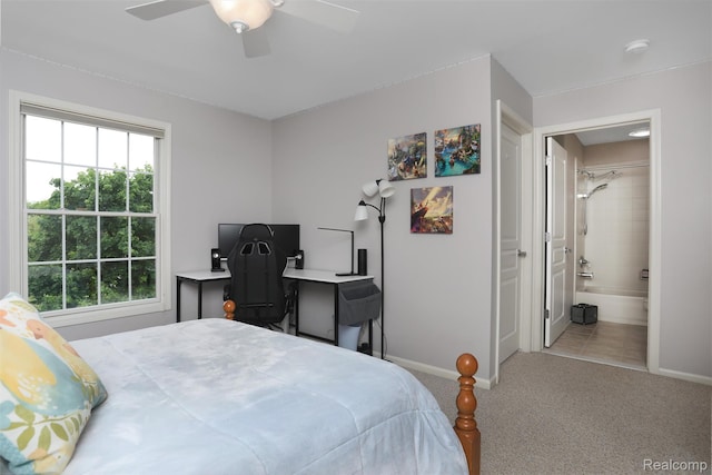 5687 Stonehaven Blvd, Rochester, MI 48306 - bedroom featuring baseboards, carpet flooring, a ceiling fan, and ensuite bath