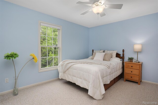 5687 Stonehaven Blvd, Rochester, MI 48306 - carpeted bedroom featuring baseboards and a ceiling fan
