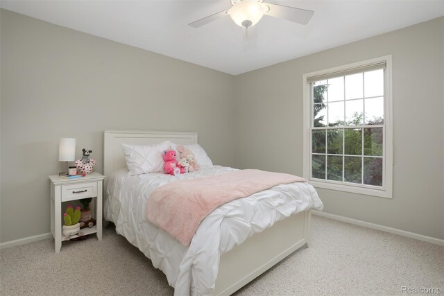 5687 Stonehaven Blvd, Rochester, MI 48306 - bedroom featuring light carpet, baseboards, and ceiling fan