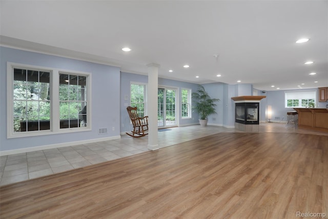 5687 Stonehaven Blvd, Rochester, MI 48306 - unfurnished living room with plenty of natural light, recessed lighting, light wood-type flooring, and baseboards