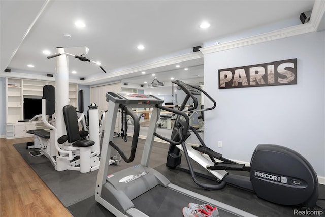 5687 Stonehaven Blvd, Rochester, MI 48306 - exercise room with crown molding, recessed lighting, and wood finished floors