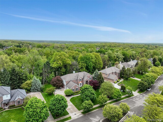 5687 Stonehaven Blvd, Rochester, MI 48306 - aerial perspective of suburban area featuring a forest