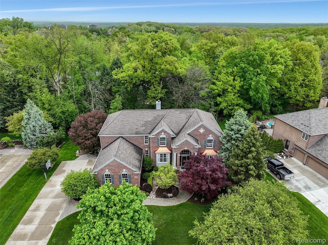 5687 Stonehaven Blvd, Rochester, MI 48306 - view from above of property featuring a forest