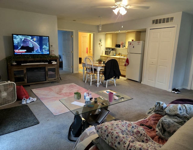25893 Clark St, Novi, MI 48375 - living area with light colored carpet and a ceiling fan