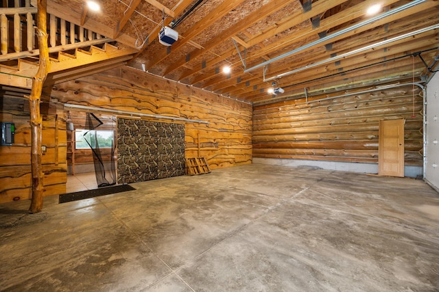 4450 50th Ave, Sears, MI 49679 - garage featuring a garage door opener
