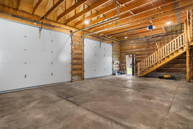 4450 50th Ave, Sears, MI 49679 - garage featuring a garage door opener