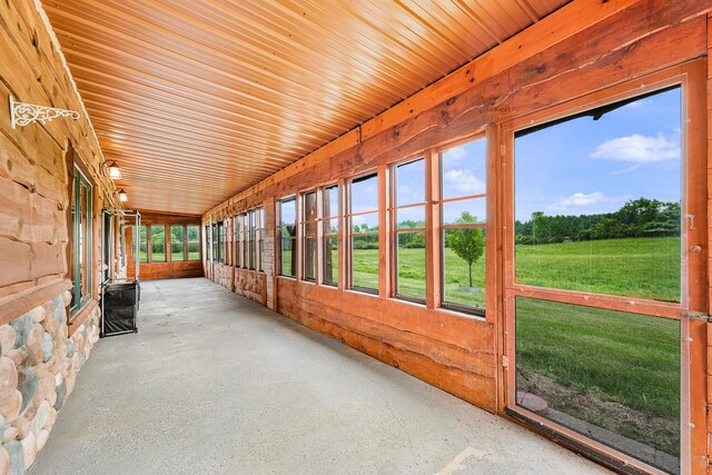 4450 50th Ave, Sears, MI 49679 - unfurnished sunroom featuring healthy amount of natural light