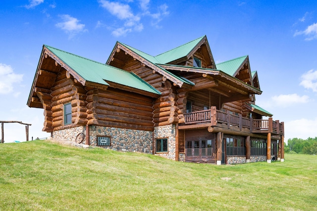 4450 50th Ave, Sears, MI 49679 - rear view of property featuring stone siding, a lawn, log siding, and metal roof